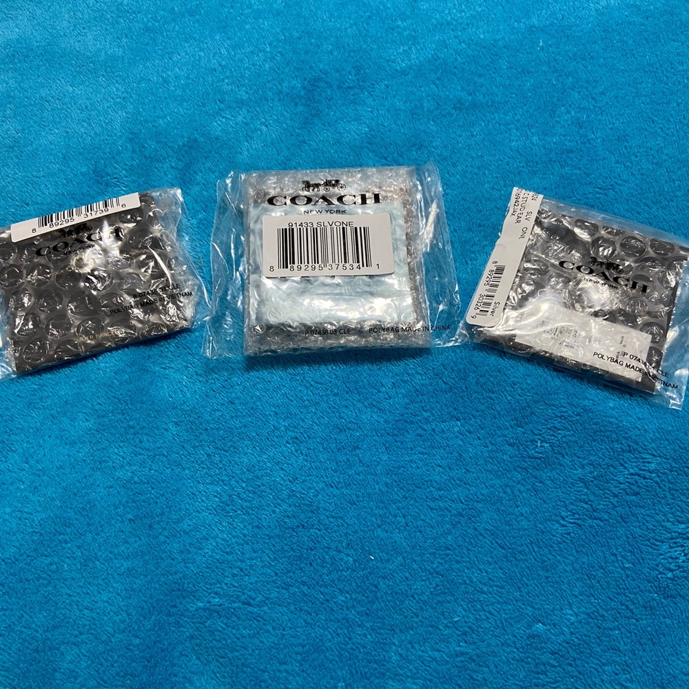 Coach brand new jewelry set. Necklace, earring and bracelet set. - Picture 2 of 11